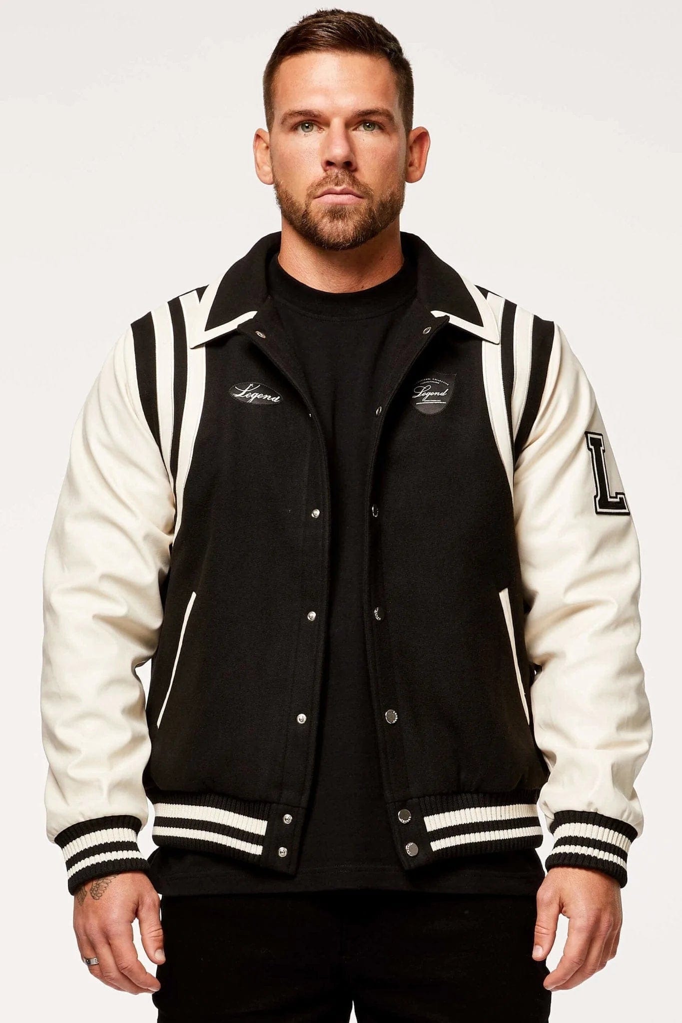 http://www.legendlondon.co/cdn/shop/products/legend-london-jackets-varsity-jacket-black-and-cream-32683414290629.webp?v=1698595474