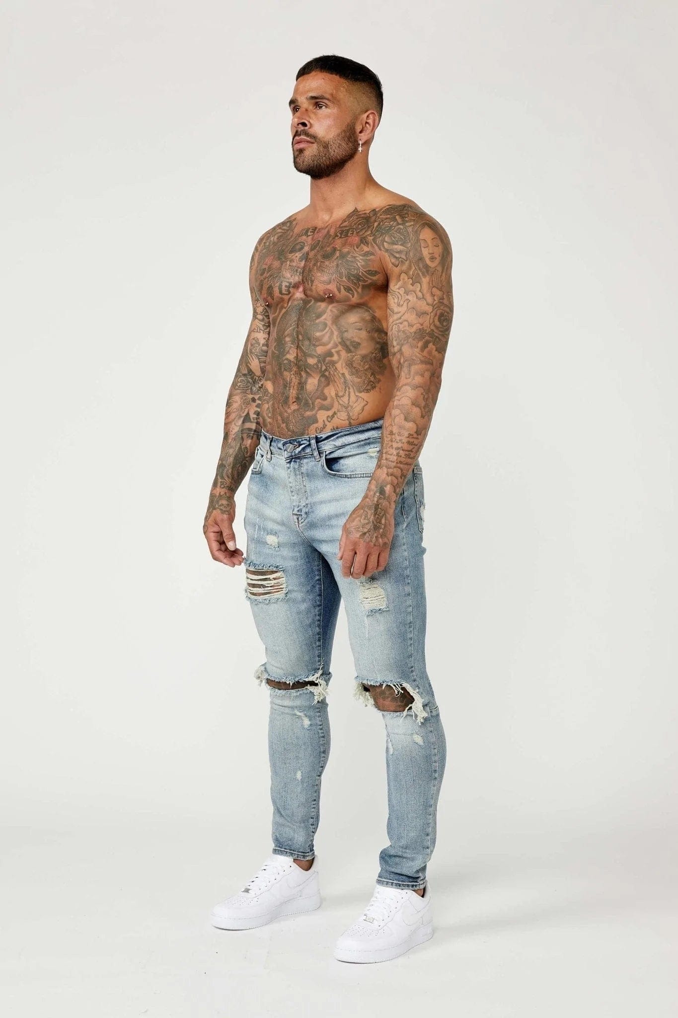 SKINNY FIT - MID BLUE RIPPED & REPAIRED – London
